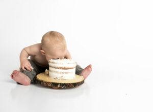 baby face down in a cake.